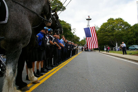 Plymouth Police and Fire personnel assemble for a Sept 11 Memorial Ceremony
