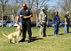 K9 Ptl M Higgins and "Shirley" demonstrate a narcotics search (21/Apr/12)