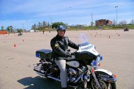Motorcycle Patrol Unit Sgt. S. Vecchi, son of former Motorcycle Patrol Unit member Ptl. A. Vecchi