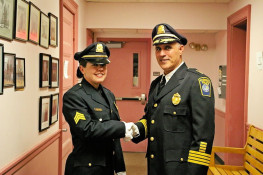Chief of Police Michael Botieri congratulates Plymouth's first female supervisor, Sgt. Laura Lincoln (6/July/10)