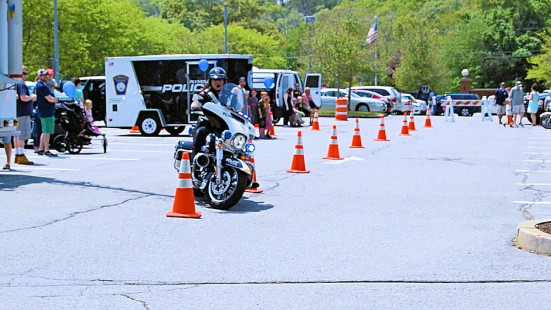 Sgt Emanuel demonstrates maneuverability of a police motorcycle.